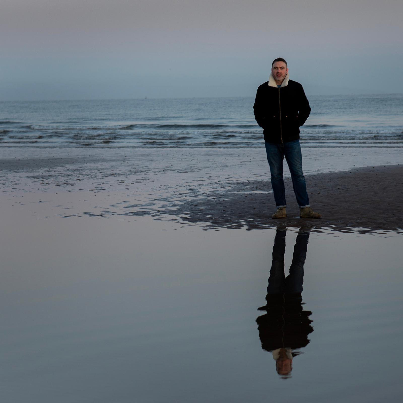 David walking on beach